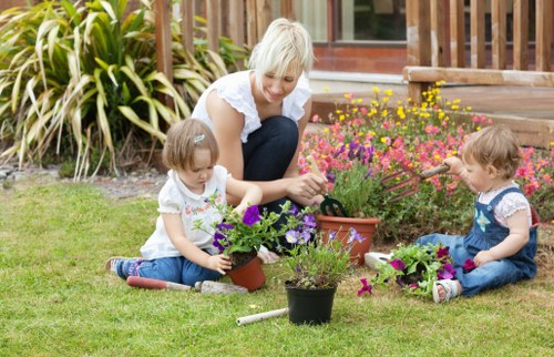 Healthy lawn care and edging as part of garden maintenance in Colney Hatch